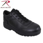 A black leather shoe with mesh detailing features laces and a sturdy sole designed for support and traction suitable for various activities in multiple environments.
