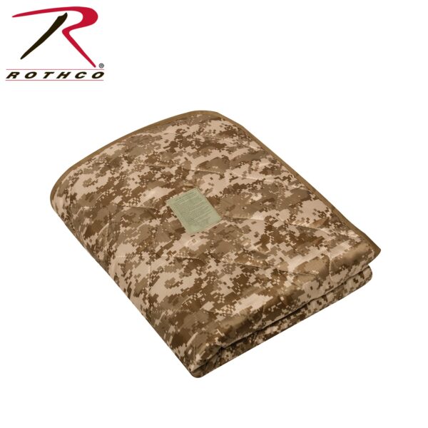 A camouflaged blanket is neatly folded showcasing a tan and brown pattern with a tag displaying care instructions prominently attached to it  set against a plain background.