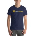 A person wearing a navy blue t-shirt with a yellow logo and text that reads WEARLEMONADE stands in a neutral setting with their hands positioned at their sides.