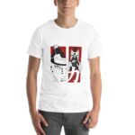 A young man stands wearing a white t-shirt featuring an artistic design of two figures in black and red surrounded by stylized elements conveying energy and strength.