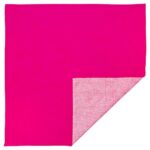 A bright pink fabric square is displayed with a folded corner revealing a lighter textured side  set against a plain background  suggesting versatility for use in various settings.