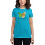 A woman wears a bright turquoise t-shirt featuring a green butterfly and sunflowers with text reading St. Patrick it's a Lucky Day against a plain background.