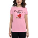 A woman wears a pink t-shirt featuring a heart-shaped padlock with a key and the text "Forever more YOU WON MY HEART" in a casual indoor setting.