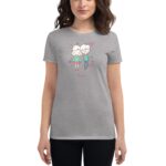 A gray t-shirt features a cartoon illustration of a girl and boy standing together with hearts around them  expressing a cute and affectionate theme.
