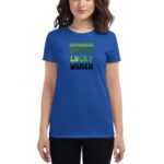 A person wearing a blue t-shirt stands  showcasing printed text that reads "EMPOWERED WOMEN LUCKY WOMEN" in various colors  conveying a message of empowerment in a casual setting.