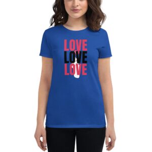 A blue t-shirt features the word "LOVE" printed multiple times in different colors. A person with dark hair stands wearing the shirt against a plain background.