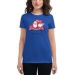 A blue t-shirt features a red truck graphic with two cartoon gnomes surrounded by hearts  holding a letter  accompanied by the text Happy Valentine's Day.