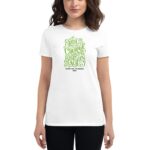 White t-shirt worn by a young woman features decorative green text saying you have the courage to begin again with a message for Happy St. Patricks 2024
