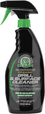 A black spray bottle with a green nozzle dispenses an organic cleaner for grills and surfaces. The label states it is biodegradable and safe for food contact surfaces.