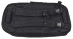 A black  flat backpack lies on a flat surface featuring adjustable straps and buckles for securing items inside the bag indicating it is designed for practical use and mobility.
