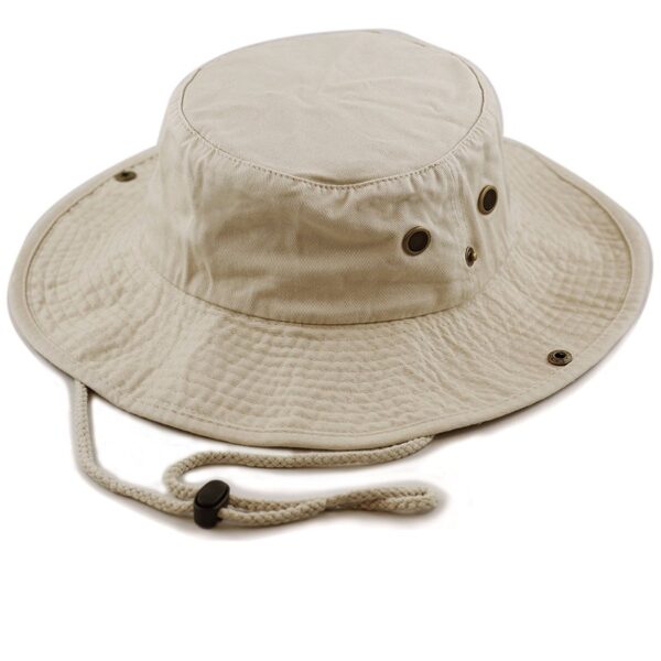 A light beige bucket hat rests flat with a rounded top and wide brim featuring ventilation holes and a drawstring for secure fitting often used for sun protection during outdoor activities.