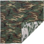 A rectangular fabric displays a camouflage pattern in greens and browns on one side while the other side features a different camouflage design in shades of green and white.