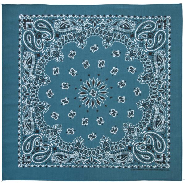 A square bandana with a teal background features intricate white paisley patterns and a central starburst design surrounded by smaller motifs creating a decorative textile.