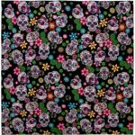 A vibrant fabric covered with intricate skull designs surrounded by colorful flowers and leaves set against a black background creating a festive and lively pattern.