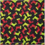 Colorful holiday stockings in red and green are playfully arranged on a black background with white polka dots creating a festive pattern ideal for seasonal decor.