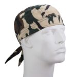 A camouflage bandana is displayed on a white mannequin head facing slightly right showcasing its patterned design and tied ends positioned behind the head.