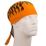A flame-patterned orange bandana is displayed on a white mannequin head facing right showcasing bright colors in a neutral setting highlighting the bandana's design and texture.