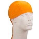 A bright orange cap sits on a white mannequin head facing slightly to the right showcasing its smooth surface and simple design in a neutral context.
