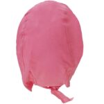 A pink bonnet with a tied chin strap is positioned upright displaying its smooth fabric texture and rounded shape set against a plain white background.