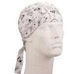 A white bandana with black paisley patterns is worn on the head of a mannequin facing slightly to the right in a neutral environment.