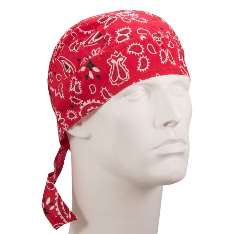 Paisley Head Wrap - 100% Cotton - Imported A red bandana with a paisley pattern adorns a white mannequin head positioned upright against a neutral background emphasizing the bold color and design of the accessory.