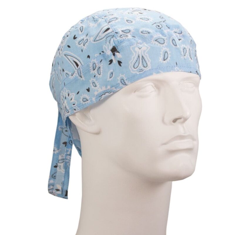 Paisley Head Wrap - 100% Cotton - Imported A light blue bandana with a paisley pattern is wrapped around a mannequin's head displaying a smooth white face in a neutral setting. The bandana features ties at the back.