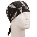 A black bandana featuring white skulls with wings is positioned on a white mannequin head facing slightly to the right in a neutral setting highlighting the design.
