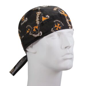 A black bandana with orange and white designs is worn on the head of a mannequin. The bandana features a repeating pattern of stars and chains  tied at the back.