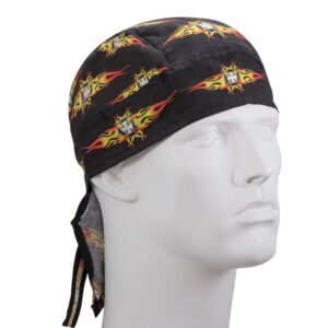 A black bandana with yellow and red flame patterns and a white cross is worn on a mannequin's head in a neutral setting. The bandana ties at the back.