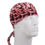 A white mannequin head displays a bandana with a striking black and red abstract pattern tied at the back in a casual manner  highlighting its stylish design.