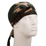 A camouflage bandana is displayed on a white mannequin head facing slightly to the right with the ties hanging down the side against a plain background.