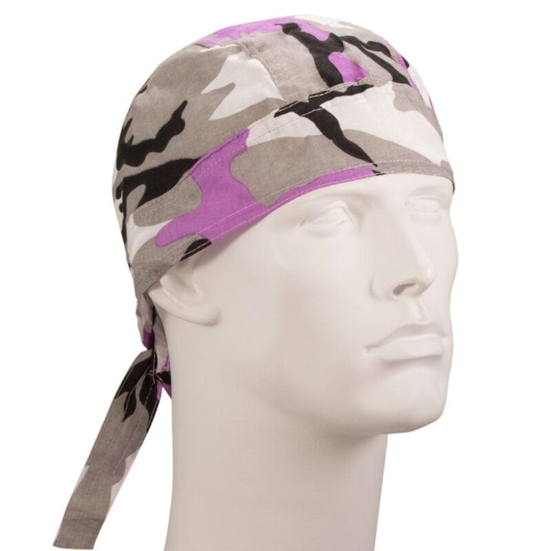A camouflage-patterned bandana with purple accents is displayed on a mannequin head showcasing its design and fit in a neutral studio setting