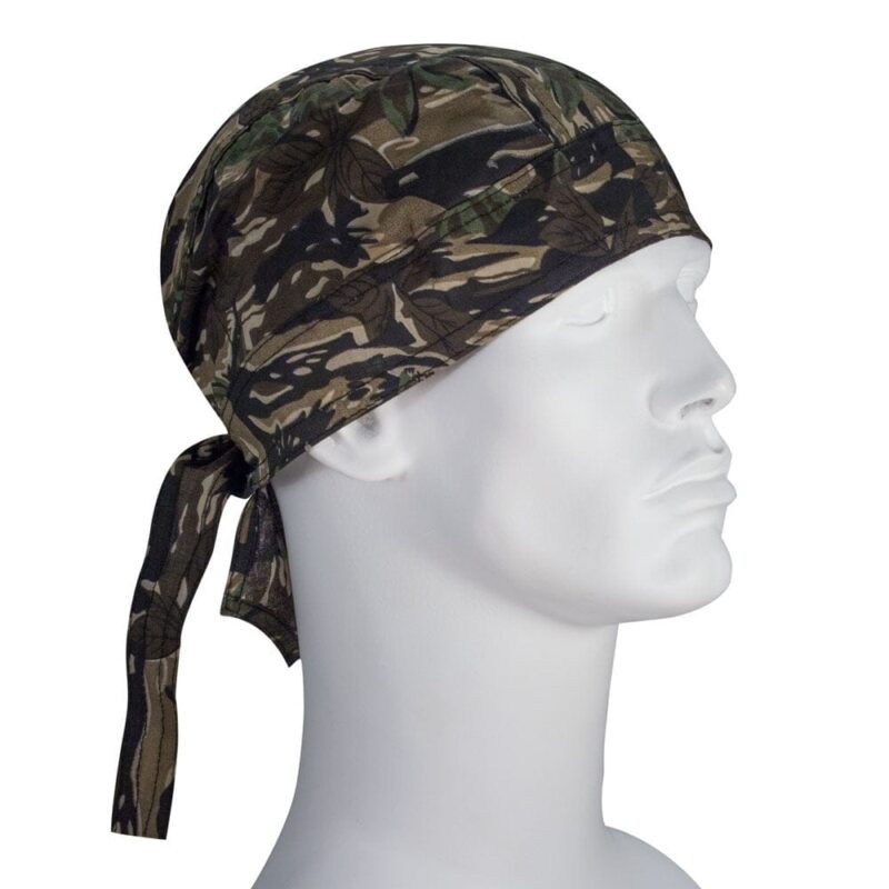 A camouflage-patterned headscarf is displayed on a white mannequin head facing right with ties hanging down the side set against a plain white background.