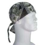 A fabric headband adorned with a money print is worn on a mannequin head showcasing a design featuring dollar bills and symbols of currency in a neutral background.