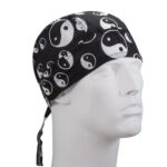 A black bandana with white yin-yang symbols is worn on the head of a white mannequin bust facing slightly to the right against a plain background.