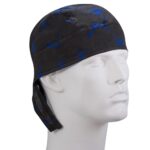 A black bandana with blue designs is positioned on a mannequin head facing slightly right  the bandana covers the forehead and has ties hanging down the sides.