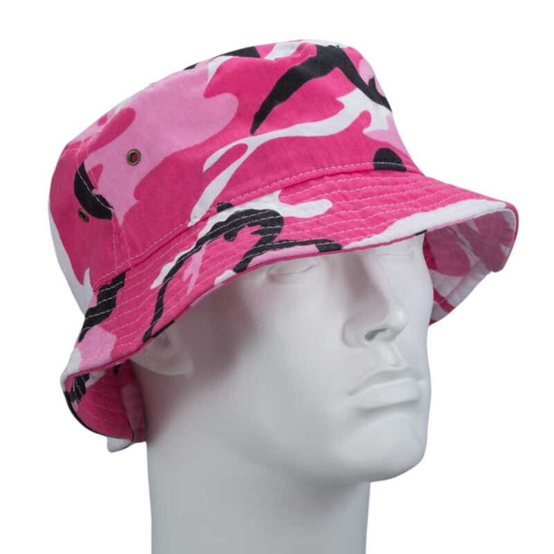 A pink camouflage bucket hat sits atop a plain white mannequin head showcasing its wide brim and patterned fabric in a neutral setting devoid of additional context.