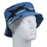 A blue camo bucket hat rests on a white mannequin head showcasing its wide brim and soft texture in a plain background highlighting its design without any distractions.