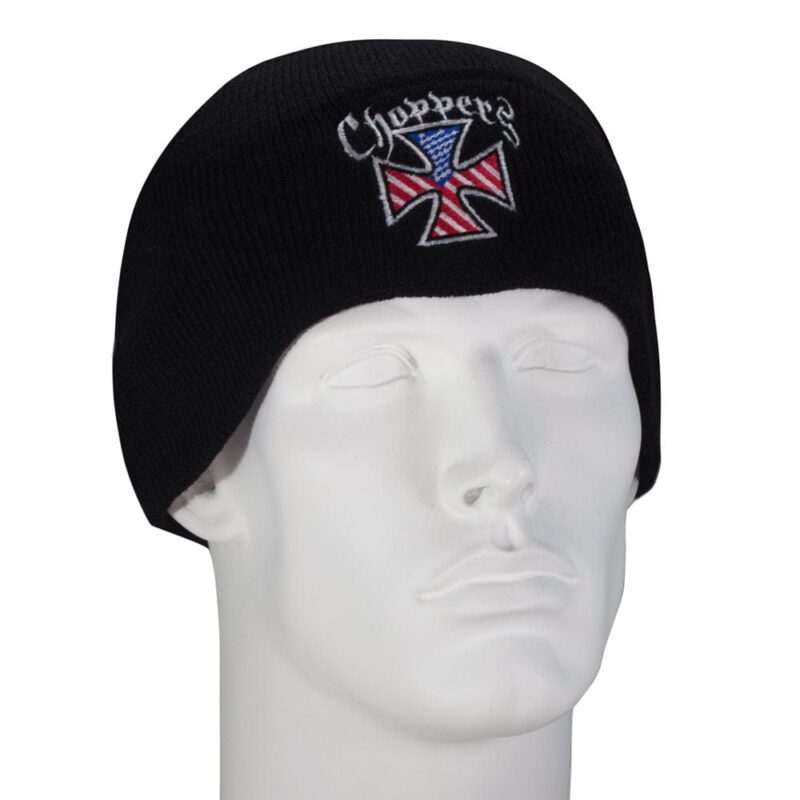 A black beanie is displayed resting on the head of a white mannequin the beanie features an embroidered design with a cross and text in a stylized font.