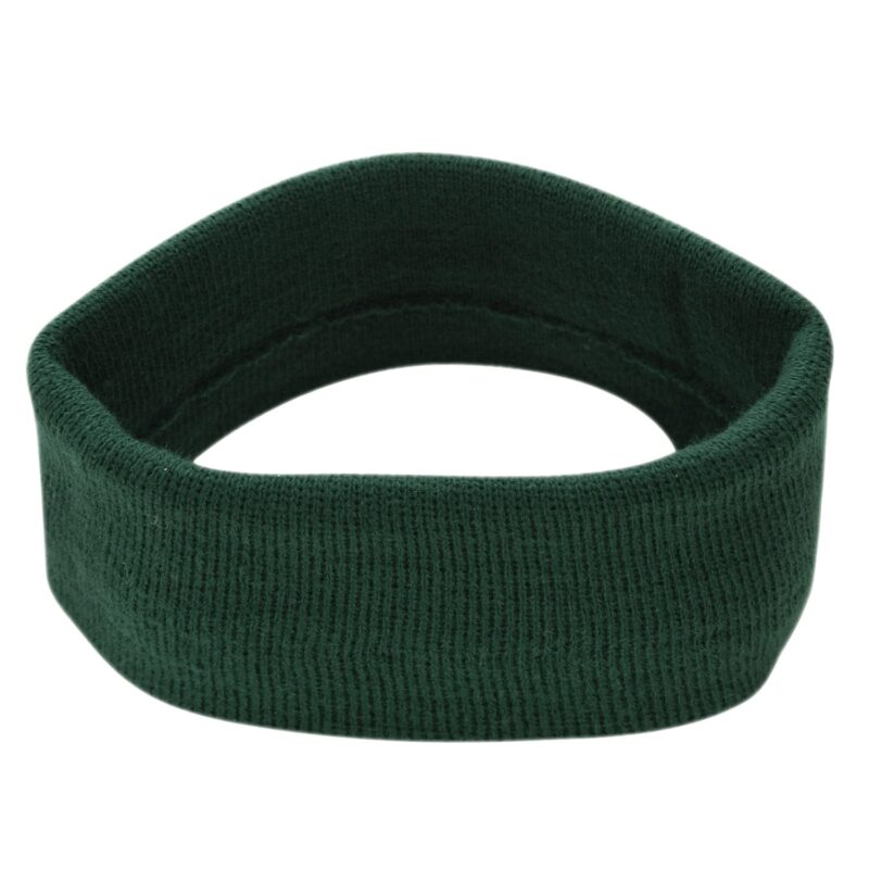 A green fabric headband rests flat with a textured surface and a circular shape designed to be worn on the head for style or sweat absorption in athletic contexts.