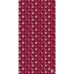 A repeating pattern of various snowflakes in cream and light pink on a deep red background creates a festive winter atmosphere suitable for seasonal decor or wrapping paper.