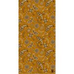 A patterned fabric with a warm golden background features intricate black paisley shapes along with floral and leaf motifs creating a visually rich textile design suitable for clothing or decor.