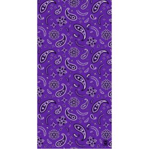 A purple patterned fabric features white paisley designs and floral motifs scattered throughout the surface creating a vibrant and decorative textile suitable for various uses such as clothing or home decor.