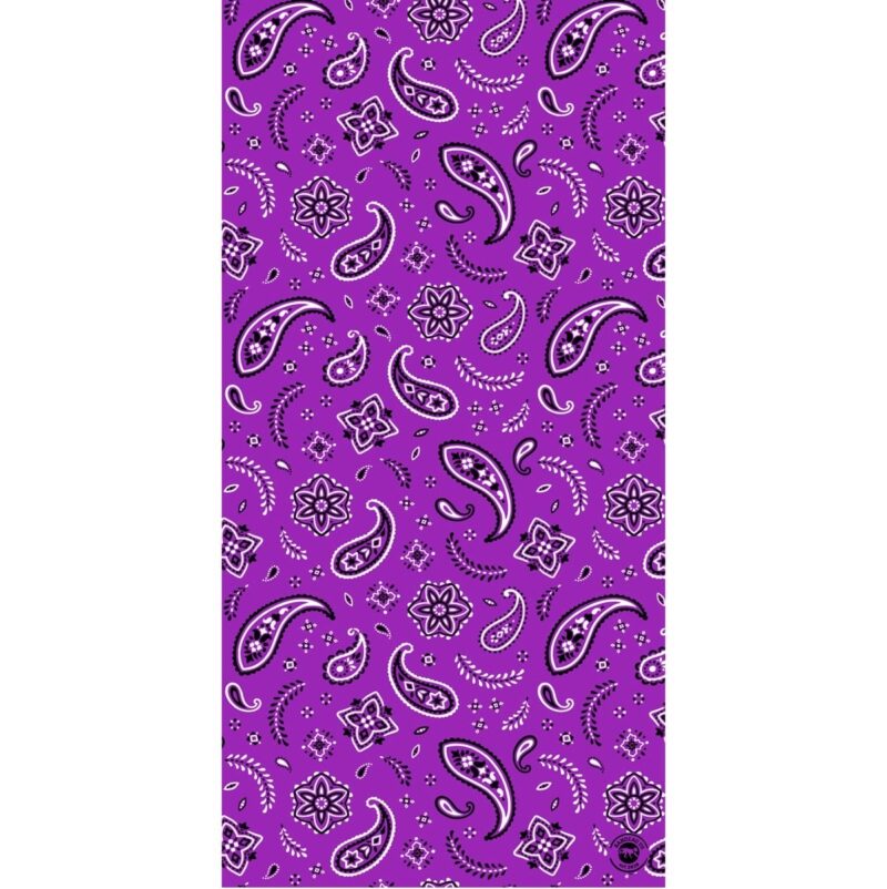 A vibrant purple fabric displays intricate paisley and floral patterns in black and white tones throughout its surface creating a lively and decorative textile design ideal for fashion or decor.