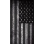 A black and white American flag displays alternating dark and light stripes with a star field featuring stars arranged in rows against a dark background creating a bold monochromatic effect.