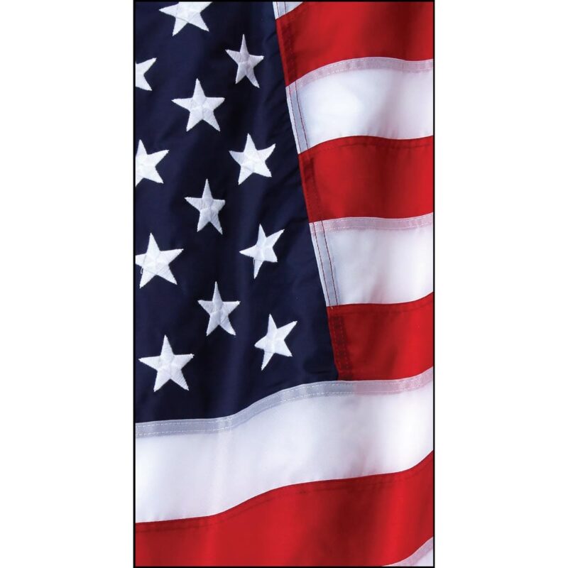 Photo US Flag Tube Headband A flag with alternating red and white stripes and a blue field adorned with white stars gently flutters in the breeze against a neutral background.