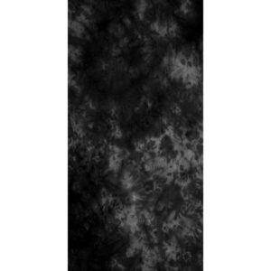 A textured black and gray patterned fabric fills the frame creating a moody and abstract backdrop with swirling shapes and variations in tone throughout the surface.